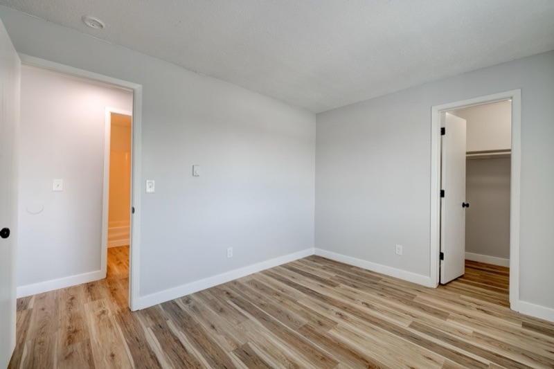 Bedroom with new flooring at The Hampton Meadows