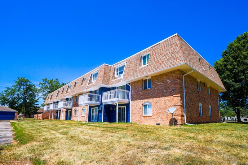 Brick apartment building at The Hampton Meadows